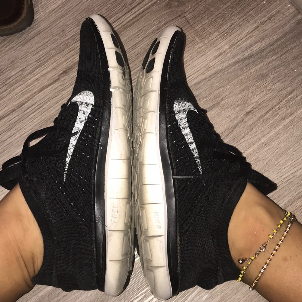 - Black Nike FlyKnit Athletic Shoes